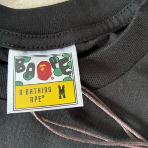 A Bathing Ape BAPE Black Ape Head Graphic Burberry Short Sleeve Tee - Image 4